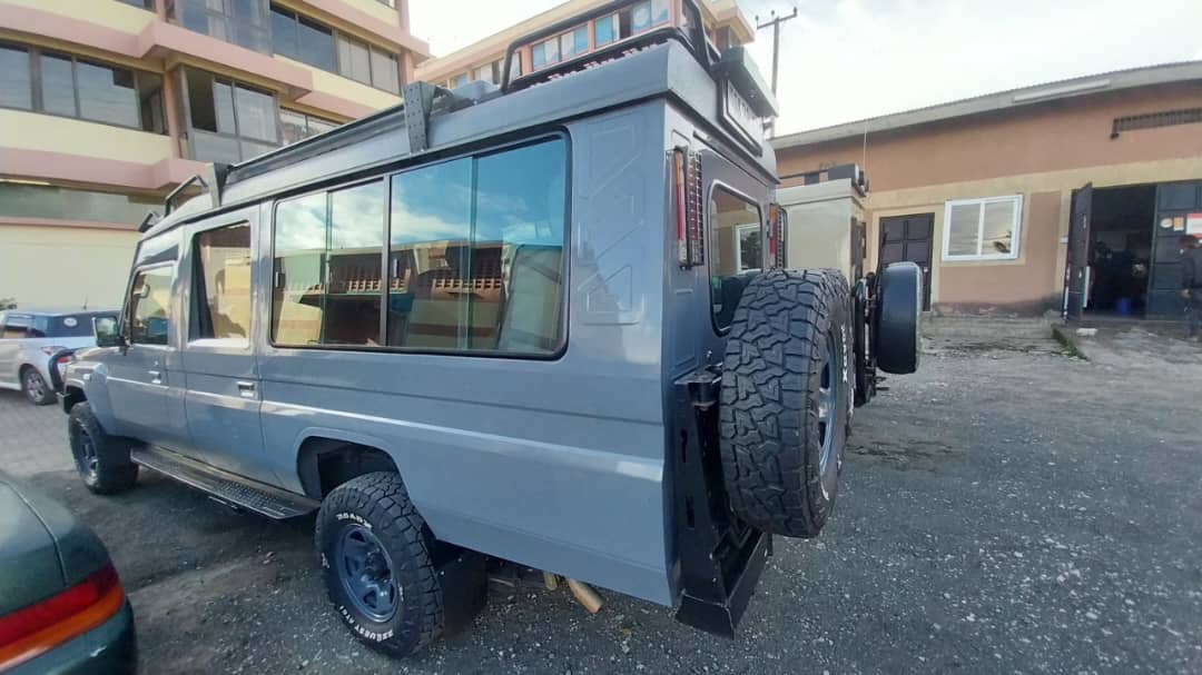 Our custom 4x4 Land Cruiser safari vehicle with pop-up roof and roof rack